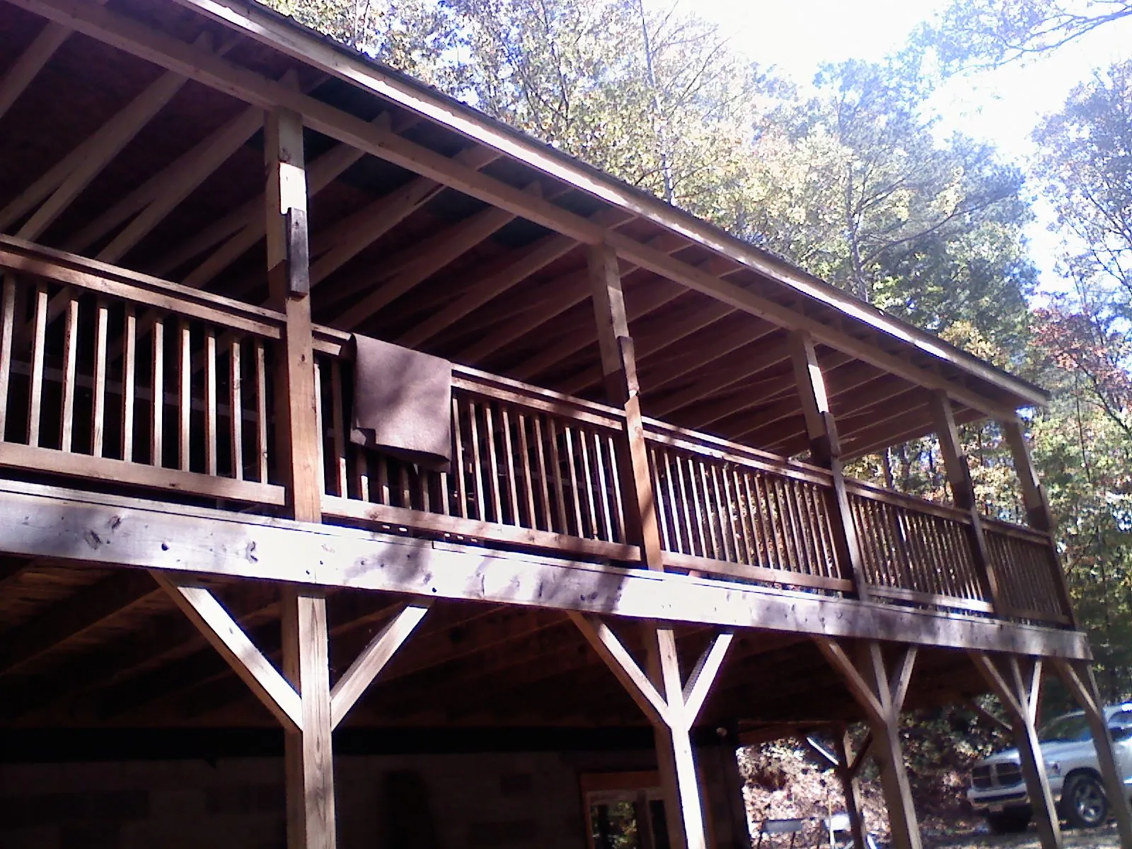 Timber framing under a new elevated porch and deck — Roof Leak Repair in Valhalla by Roofing Brothers
